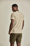 CAMISETA PIQUET BOLSO